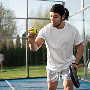 Pickleball Clothes: Style and Comfort on the Court 19 low angle man playing paddle tennis